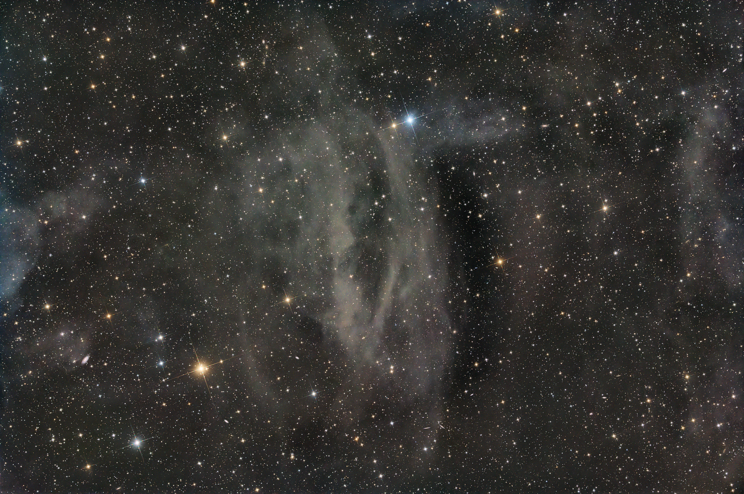 The Cosmic Hairpin (Sh2-73) is a dust cloud in the constellation Hercules illuminated by the light of the Milky Way. Nebulae of this type are also known as galactic cirrus clouds.